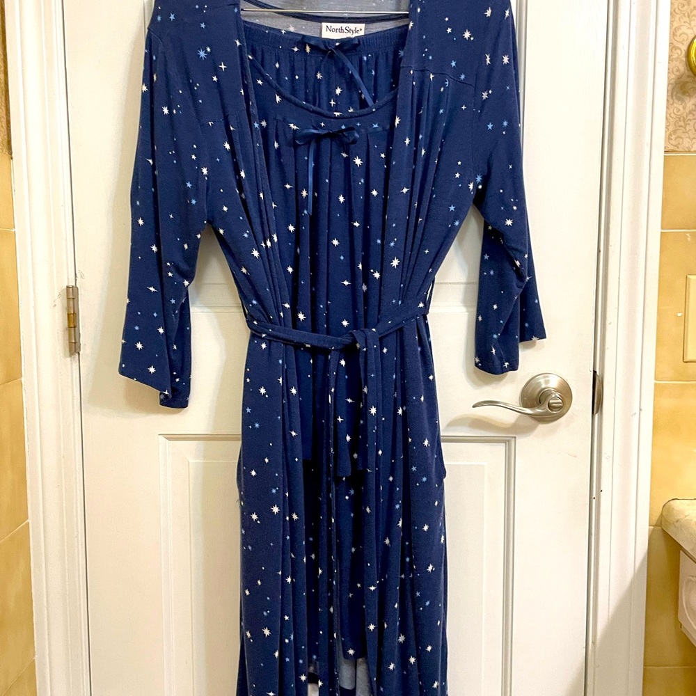 Three piece pajama and robe set in navy blue with white stars pattern.